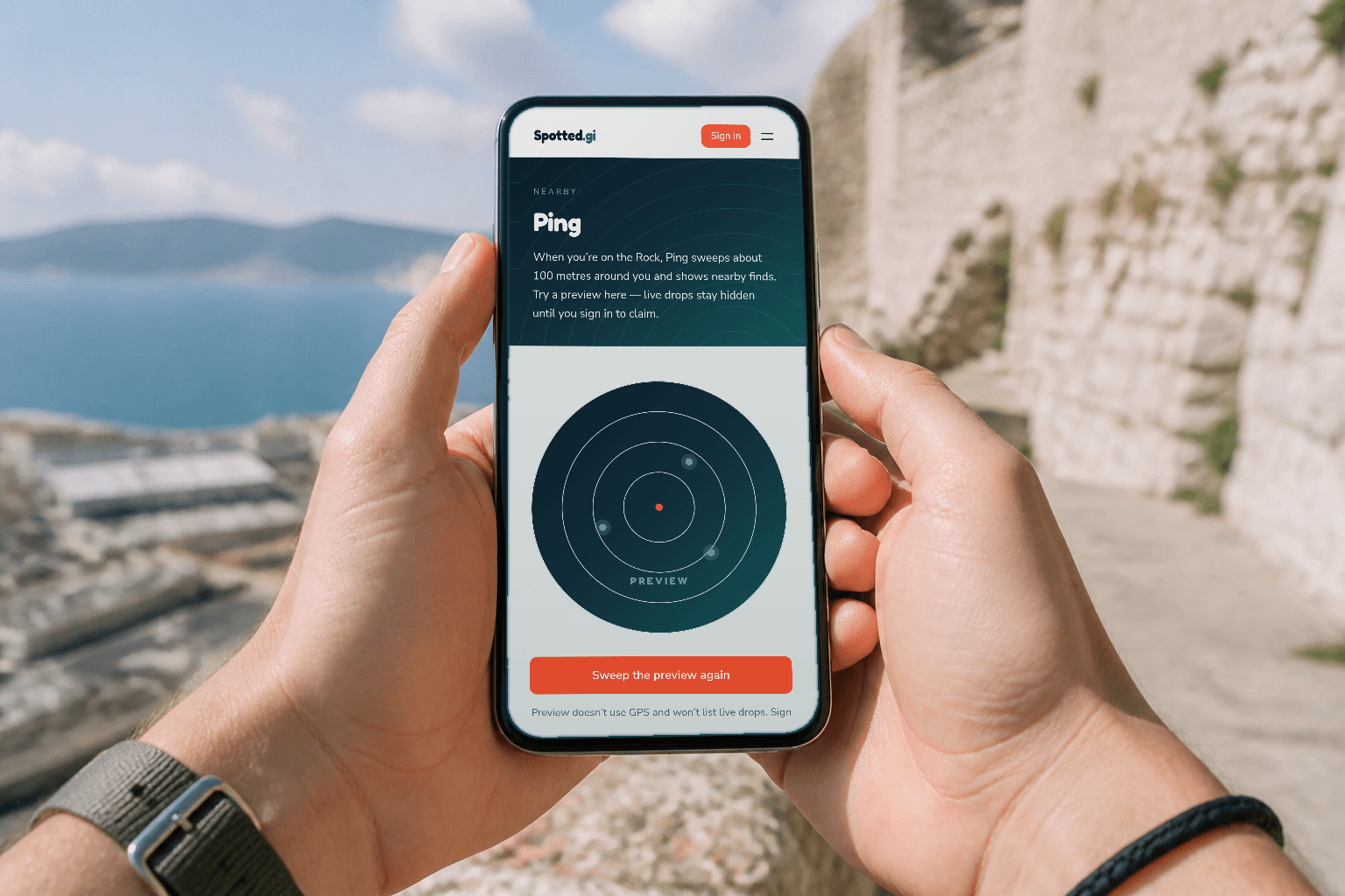 Hands holding a phone on the Rock, showing Ping’s radar with three nearby-find blips and a Preview label.